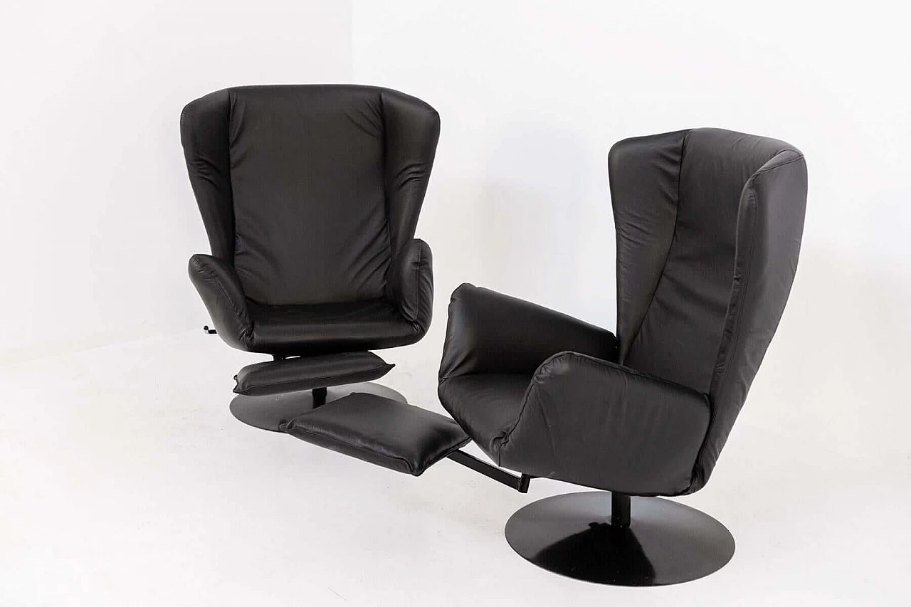 Pair of black leather armchairs with footrest cushion, 1970s 1405537