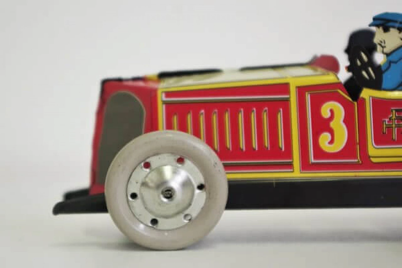 15 Tin car toy, 1990s 1406996