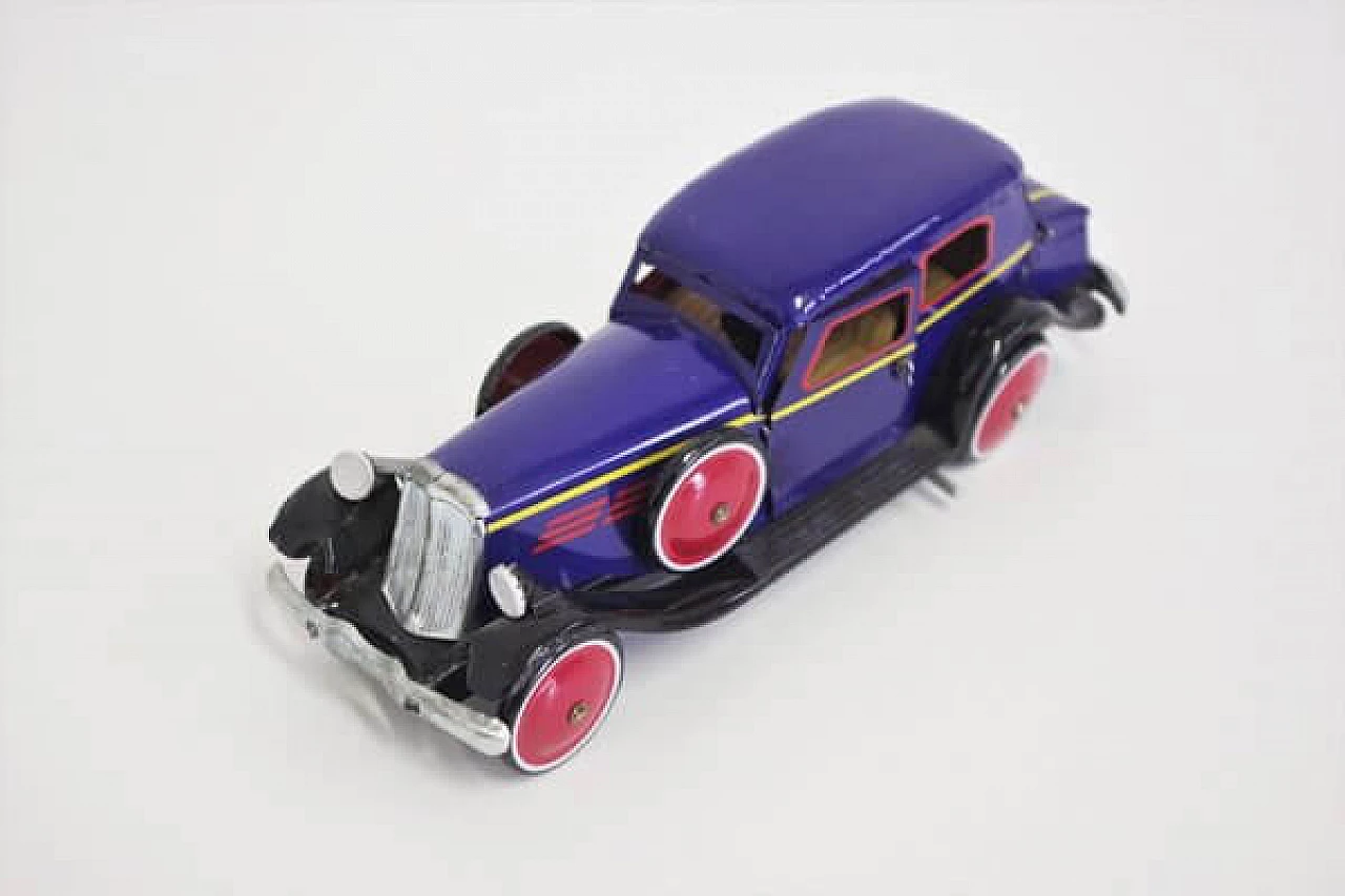 15 Tin car toy, 1990s 1407032