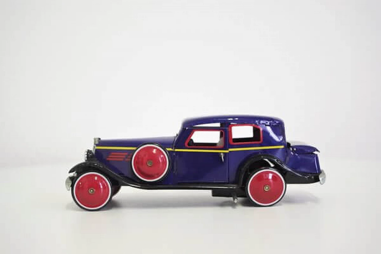 15 Tin car toy, 1990s 1407034