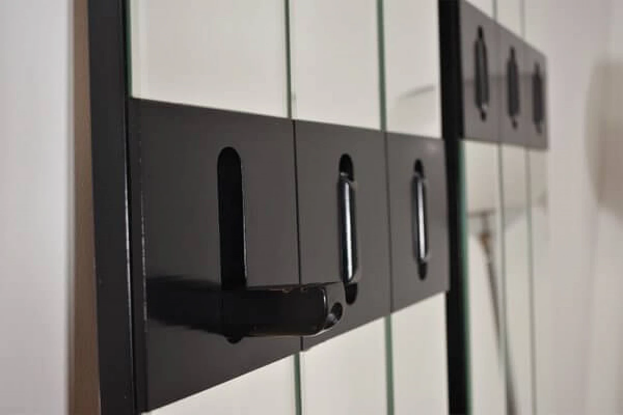 Pair of wall-mounted coat hangers with mirror, 1970s 1407322