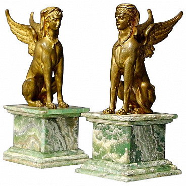 Pair of bronze sphinxes with alabaster base, 19th century
