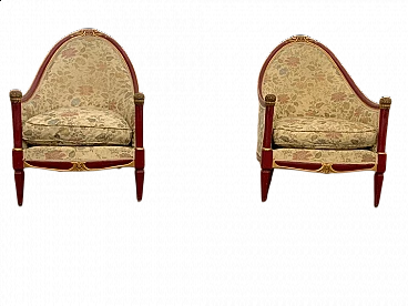 Pair of Art Deco red lacquered armchairs with carved details, 1930s