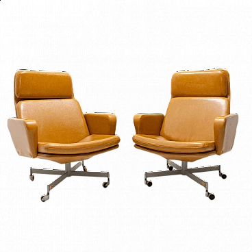 Pair of leatherette swivel armchairs, 1970s