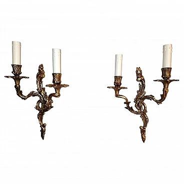 Pair of Louis XVI style wall sconces in gilded and chiseled bronze, 20s