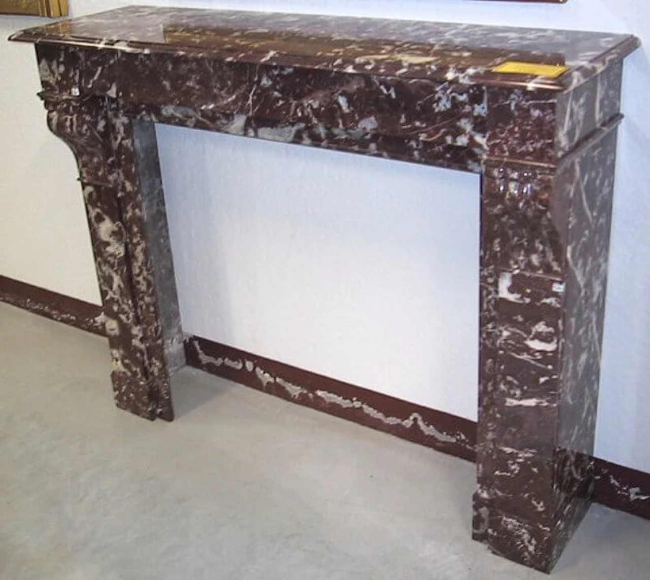 Palmettes model fireplace frame in red marble, 19th century 1461589
