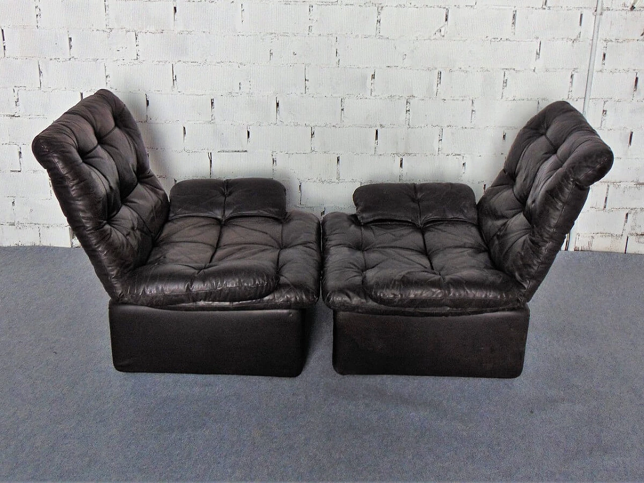 Pair of leather armchairs, 1970s 9