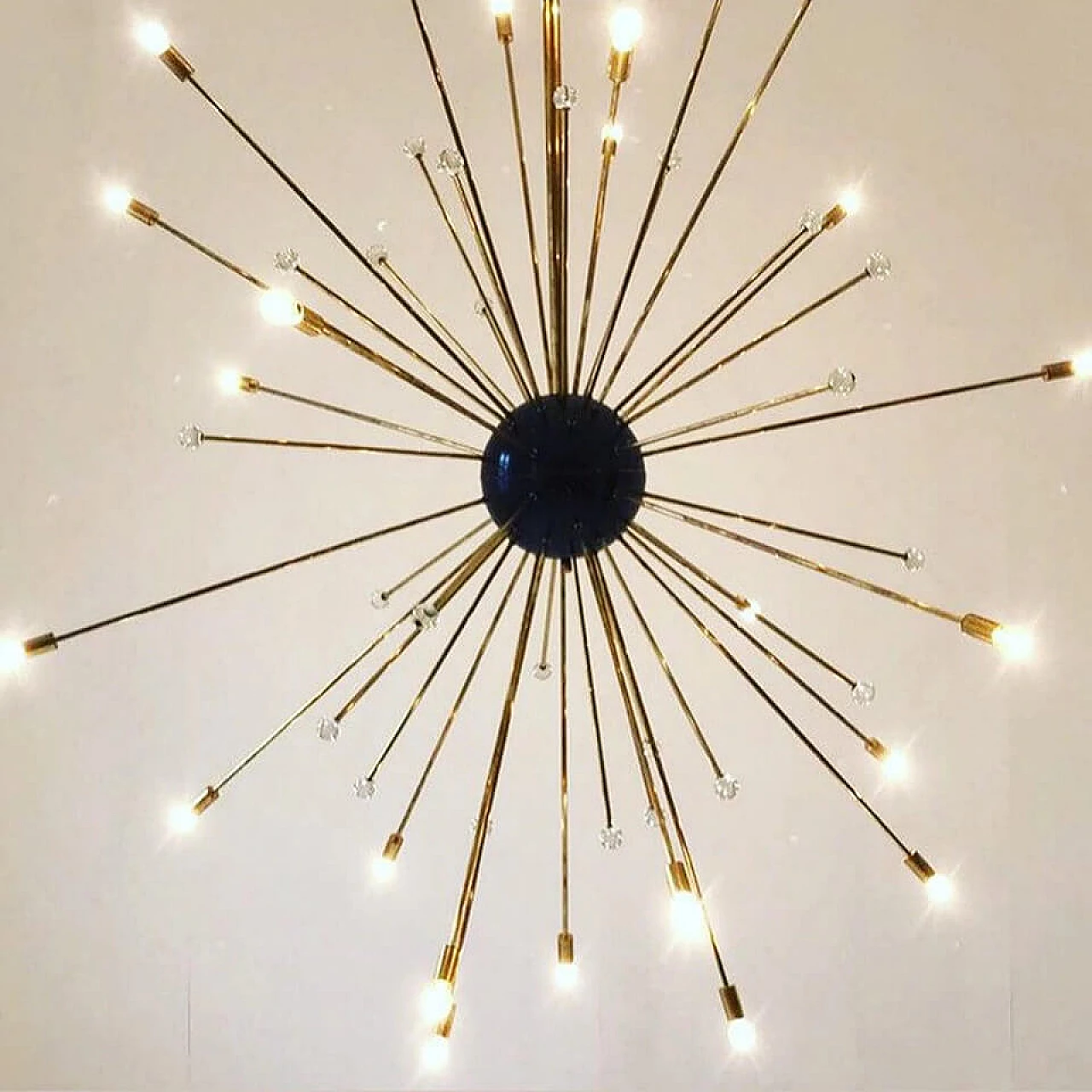 Sputnik chandelier in the style of Stilnovo in brass and metal, 70s 1