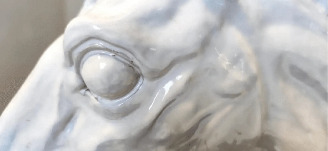 Sculpture depicting a terracotta horse's head, 1980s 12