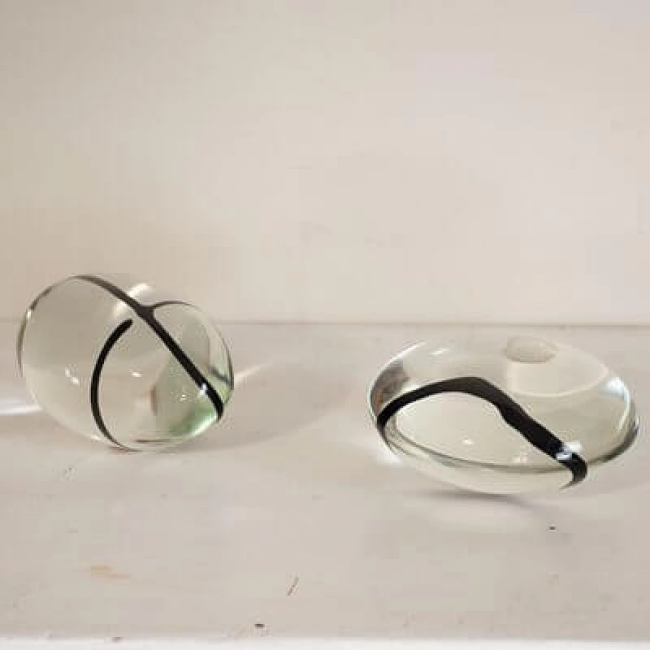 Pair of Murano glass paperweights with black veins, 1960s 1