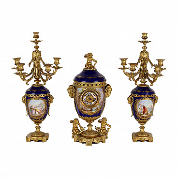 Clock and two candlesticks in bronze and porcelain of Sevrès, late 19th century
