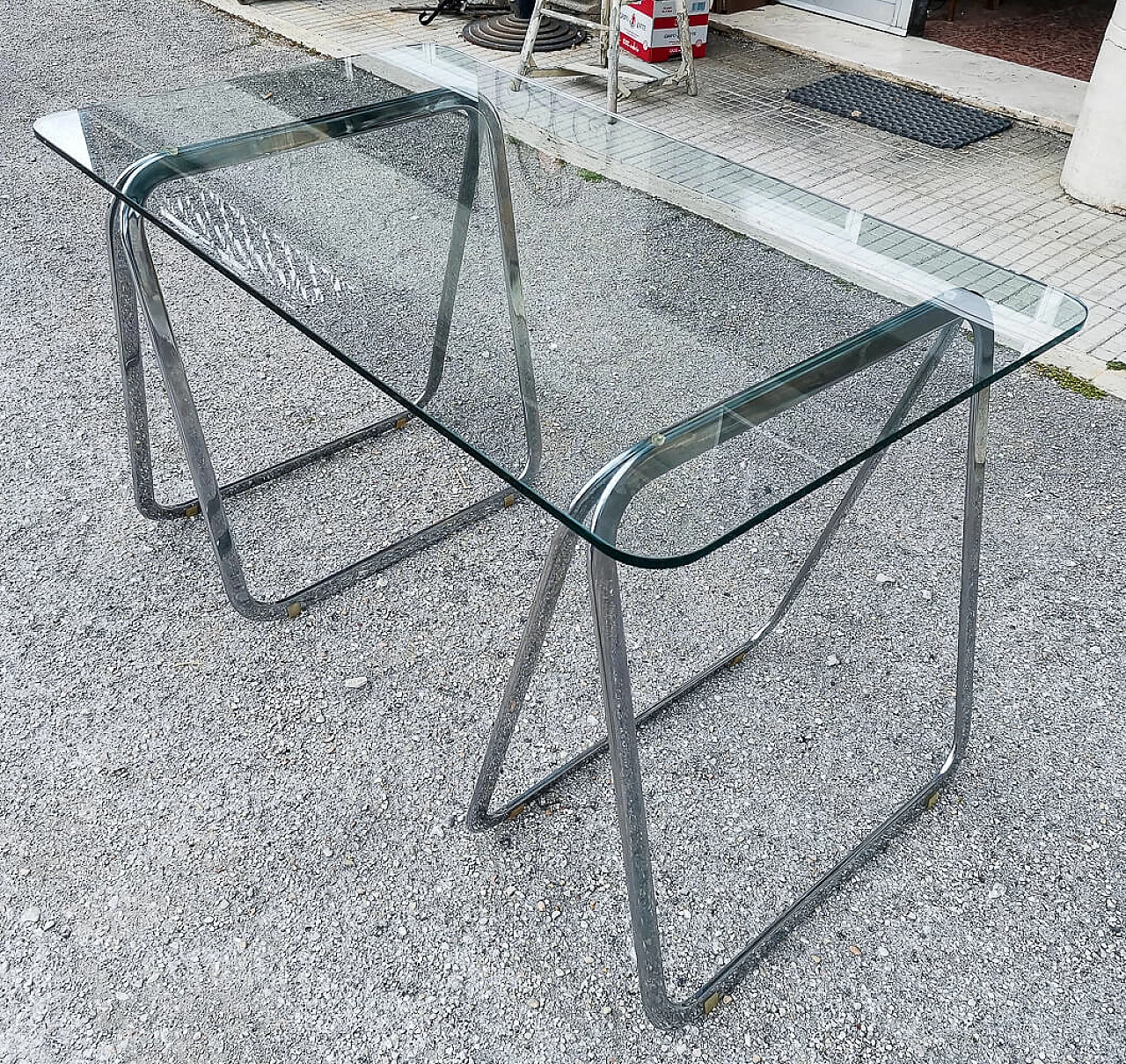 Table with crystal top and chrome trestles, 1990s 2