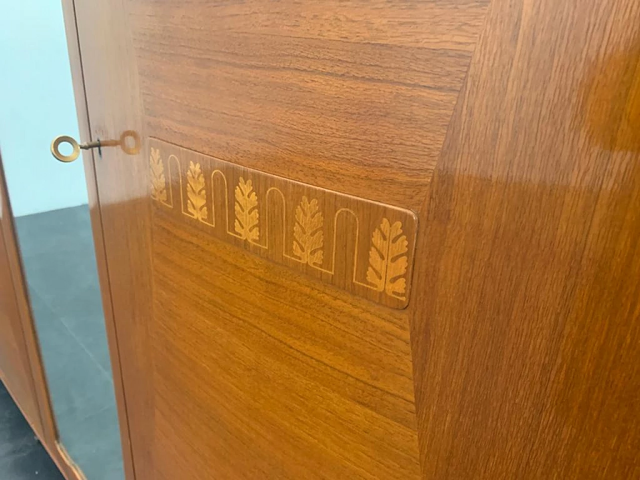 Closet with inlaid domed doors and brass finials, 1950s 9