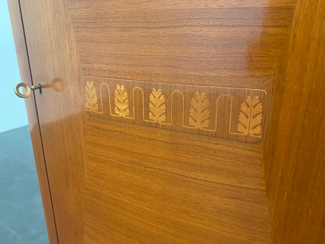 Closet with inlaid domed doors and brass finials, 1950s 10