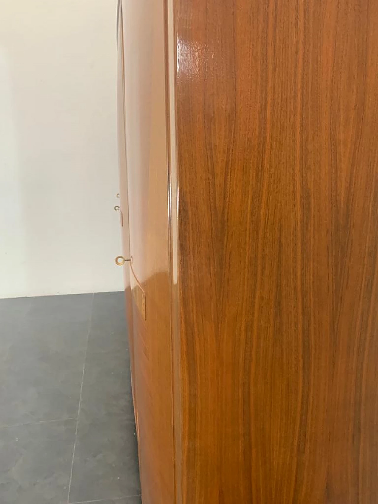 Closet with inlaid domed doors and brass finials, 1950s 12