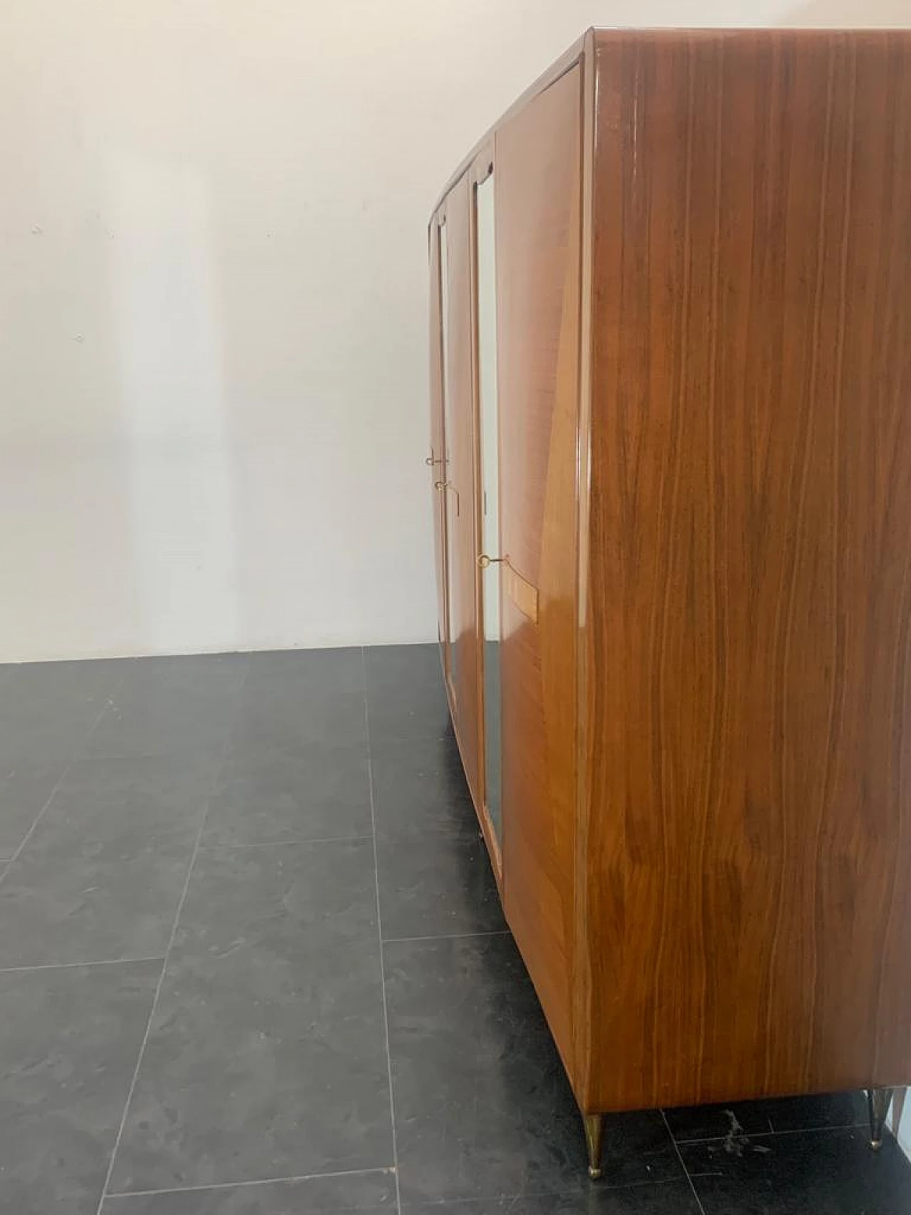 Closet with inlaid domed doors and brass finials, 1950s 13