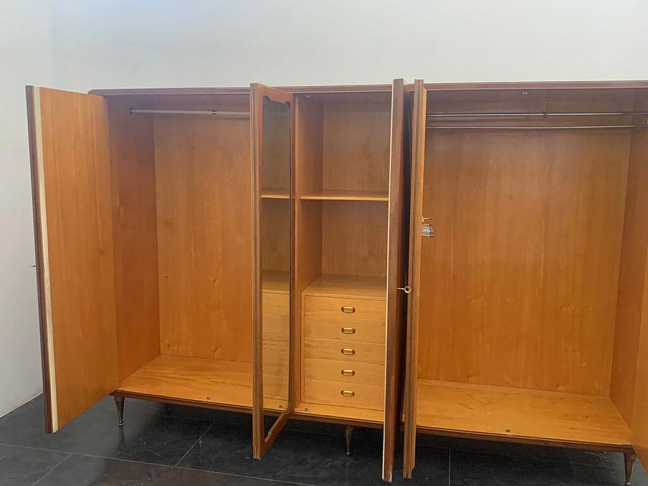 Closet with inlaid domed doors and brass finials, 1950s 16