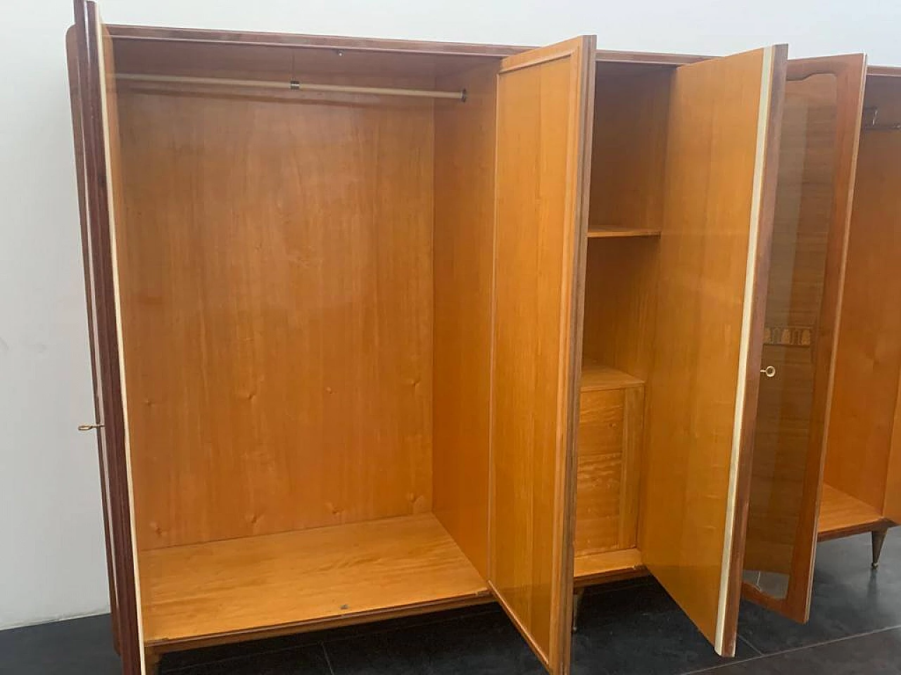 Closet with inlaid domed doors and brass finials, 1950s 17