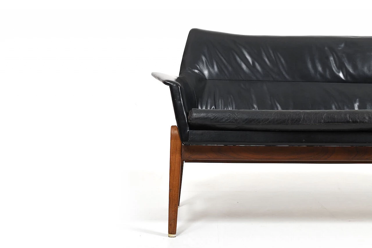 Wing leather and teak sofa by Ib Kofod-Larsen, 1950s 3