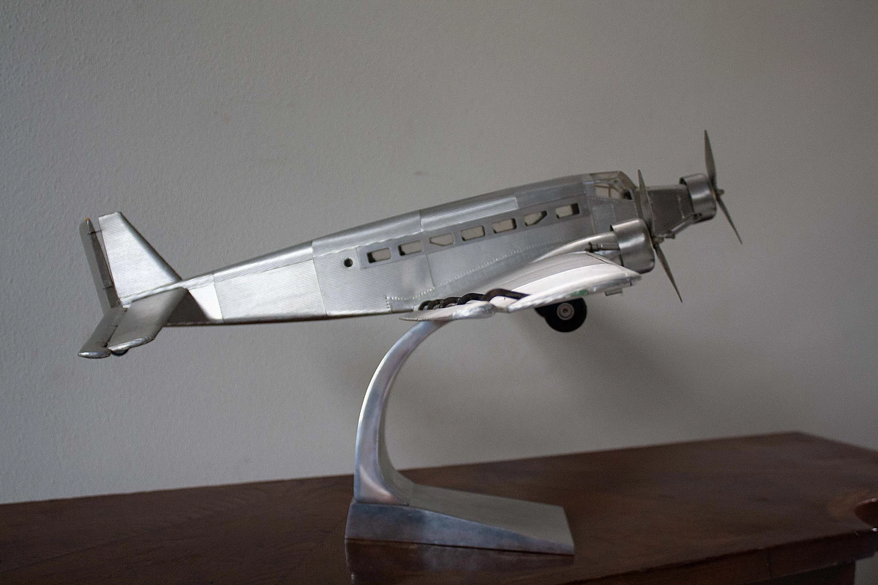 Aluminium aeroplane toy, 1970s 4