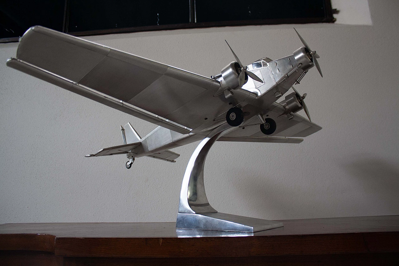 Aluminium aeroplane toy, 1970s 8