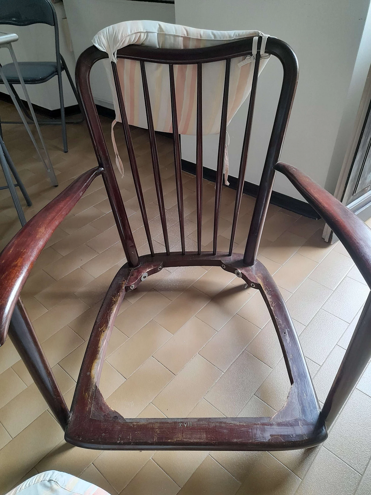 Dark wood upholstered armchair, 1950s 5