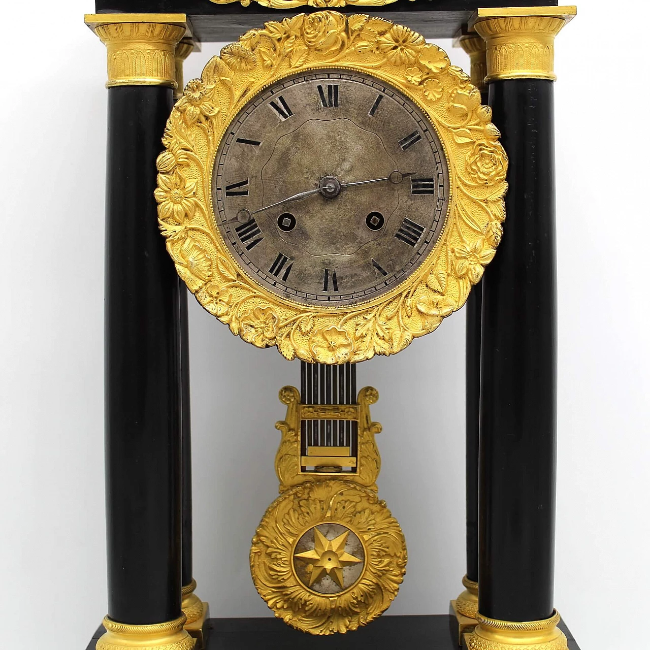 Empire style pendulum clock in ebonized wood, early 19th century 2
