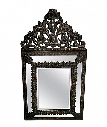 Napoleon III style wall mirror with Repoussé work in burnished brass, 19th century