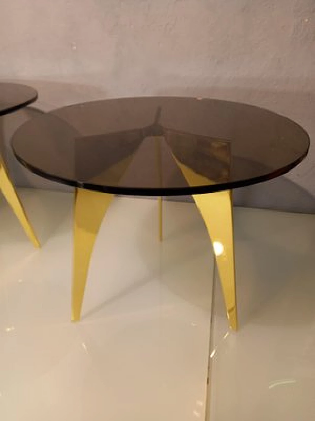 Round brass table with bronzed glass top 10