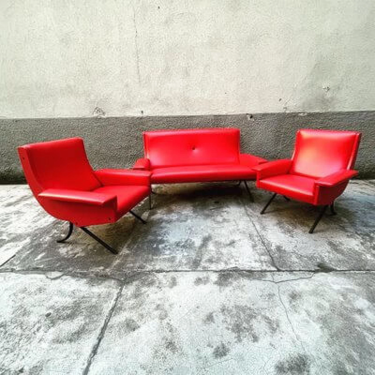 Sofa and pair of armchairs in red skai, 1960s 1