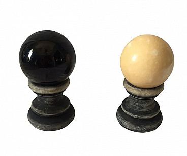 Pair of marble spheres on a black and beige wooden base, 1960s