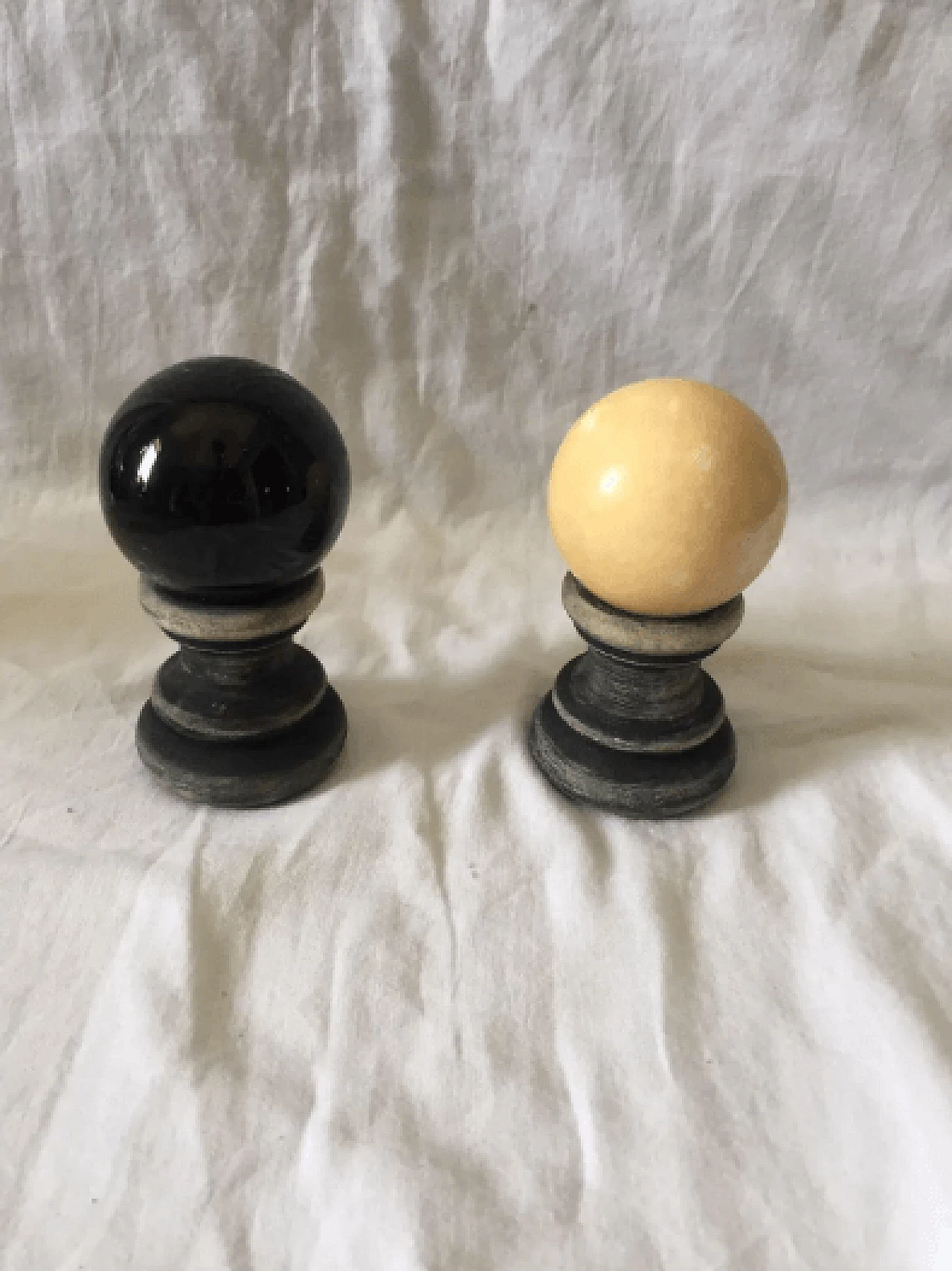 Pair of marble spheres on a black and beige wooden base, 1960s 2
