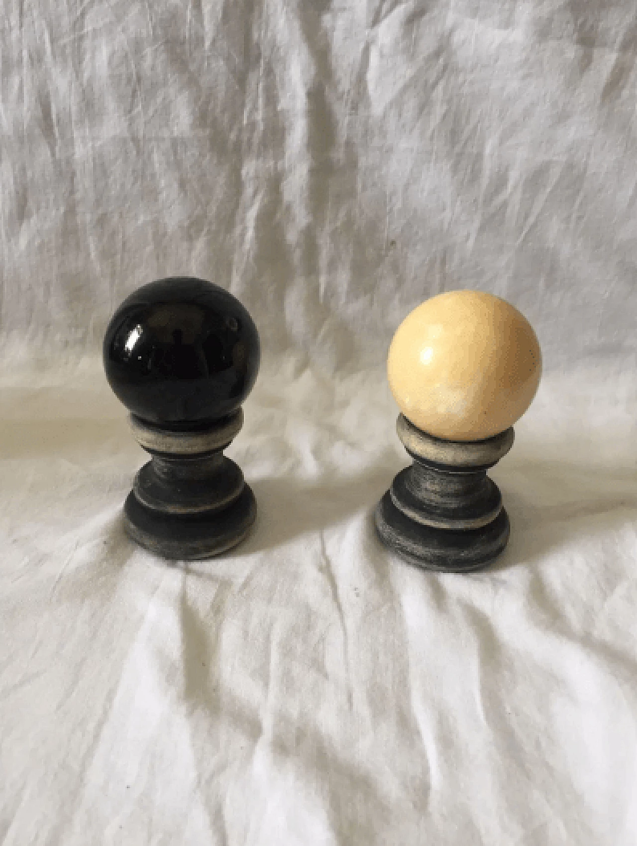 Pair of marble spheres on a black and beige wooden base, 1960s 3