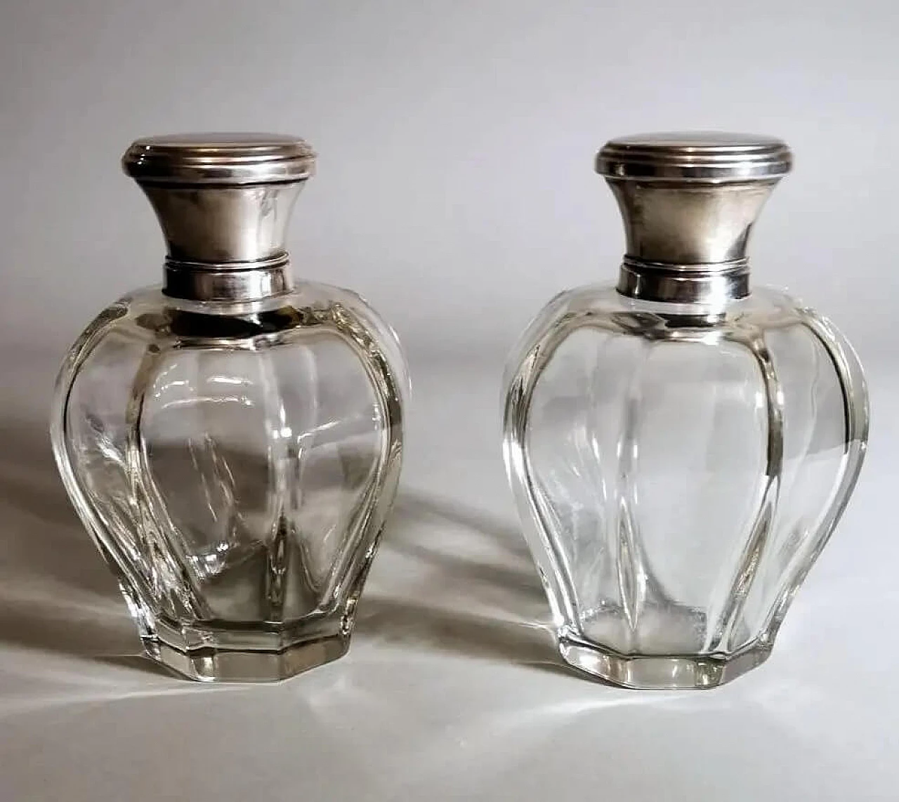 Pair of Art Deco crystal toiletry bottles and silver lids, 1930s 5