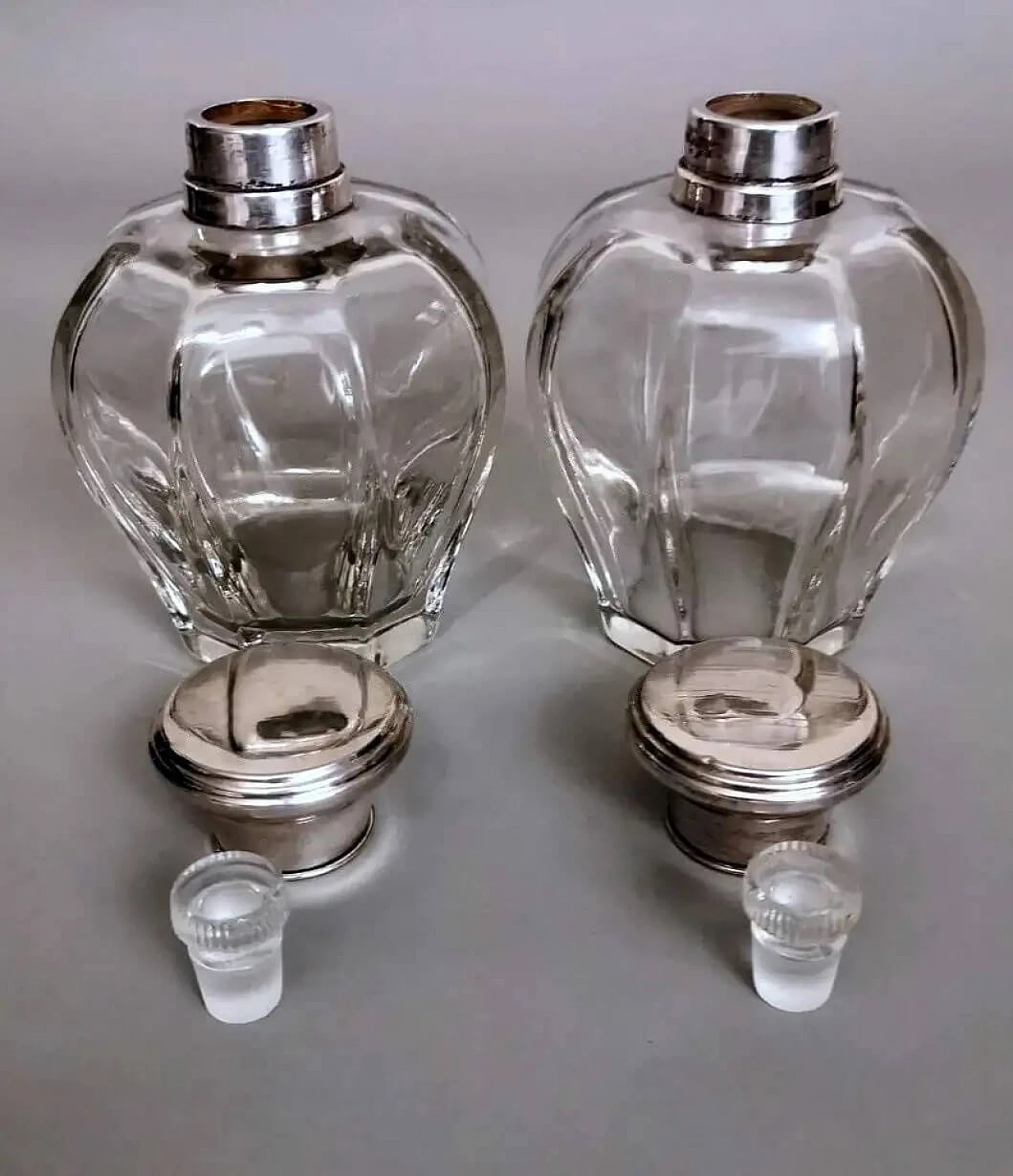 Pair of Art Deco crystal toiletry bottles and silver lids, 1930s 9