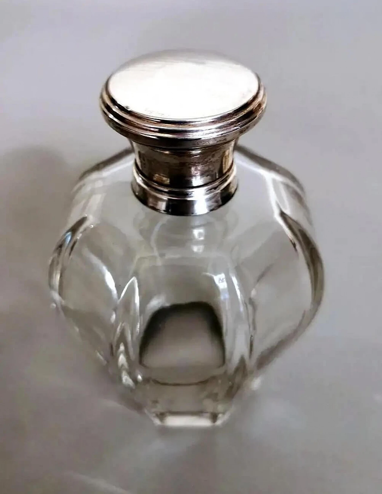 Pair of Art Deco crystal toiletry bottles and silver lids, 1930s 11