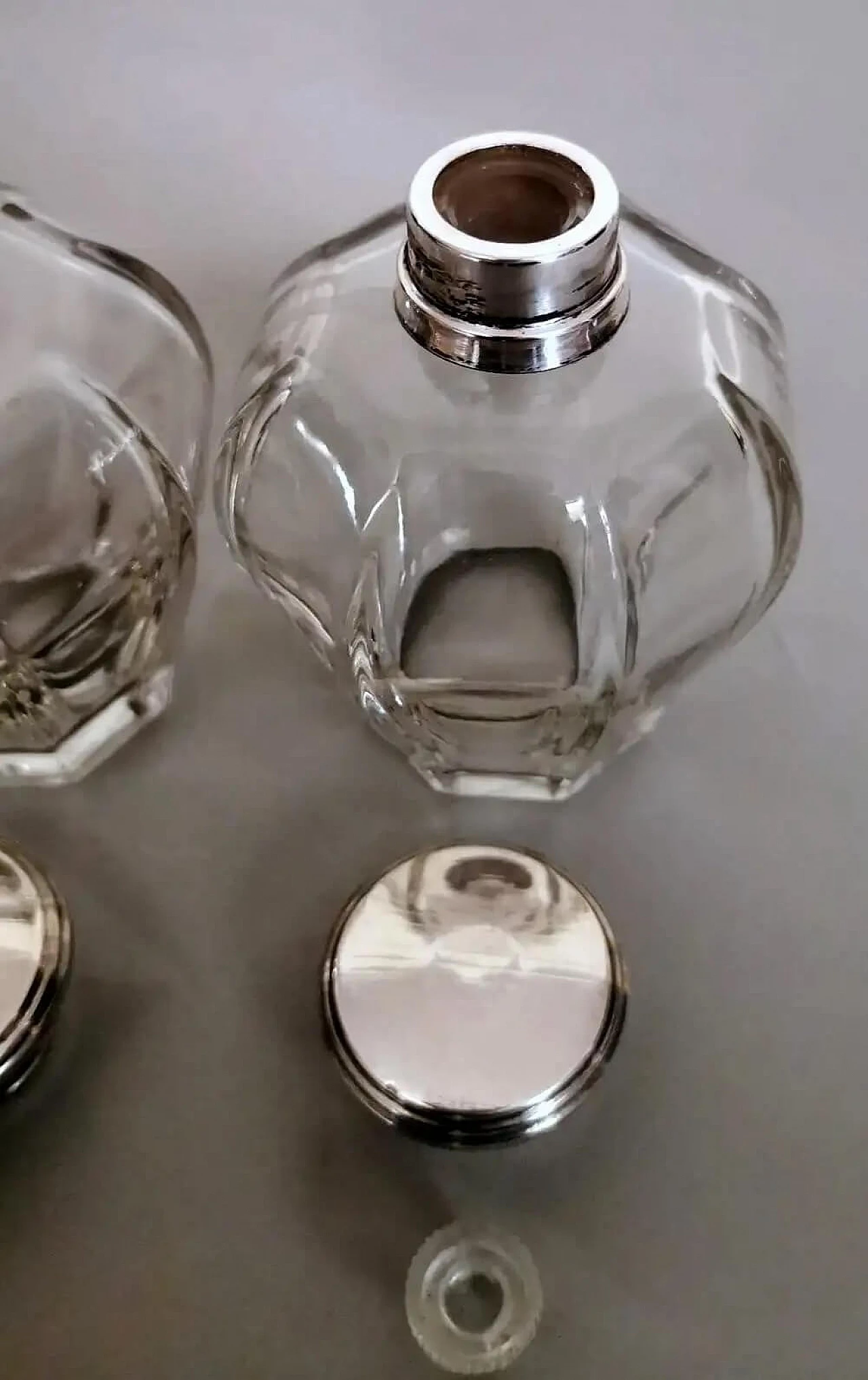 Pair of Art Deco crystal toiletry bottles and silver lids, 1930s 14