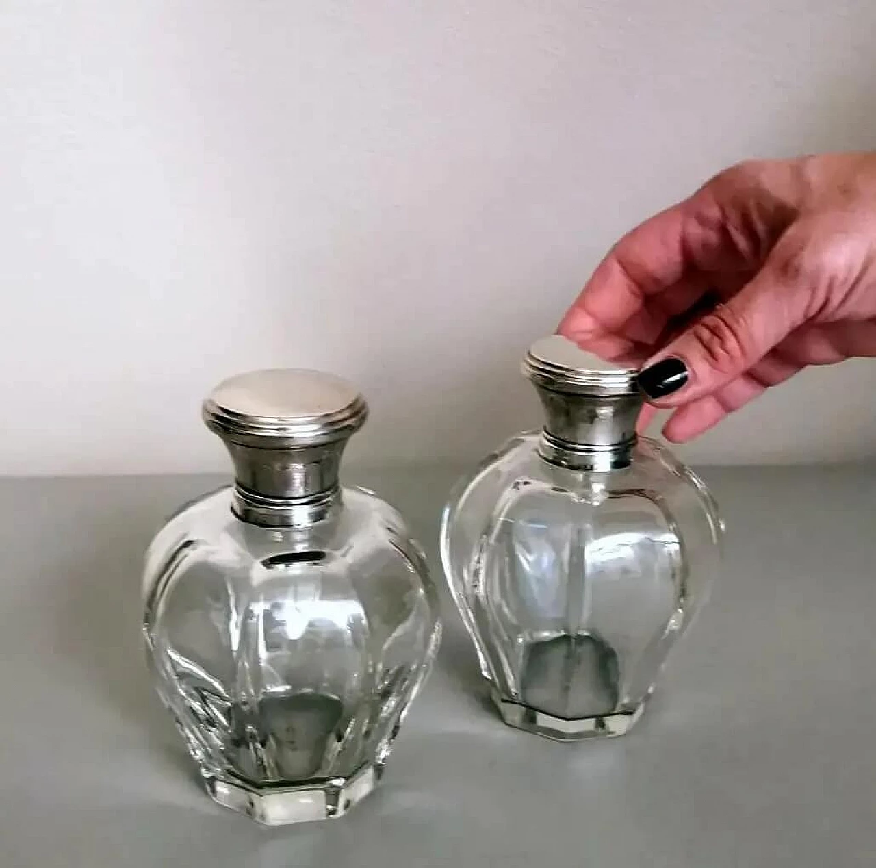Pair of Art Deco crystal toiletry bottles and silver lids, 1930s 16