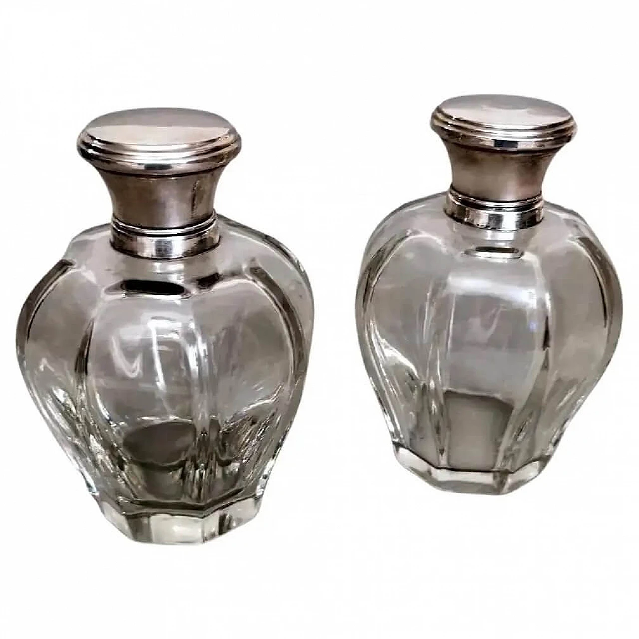 Pair of Art Deco crystal toiletry bottles and silver lids, 1930s 17