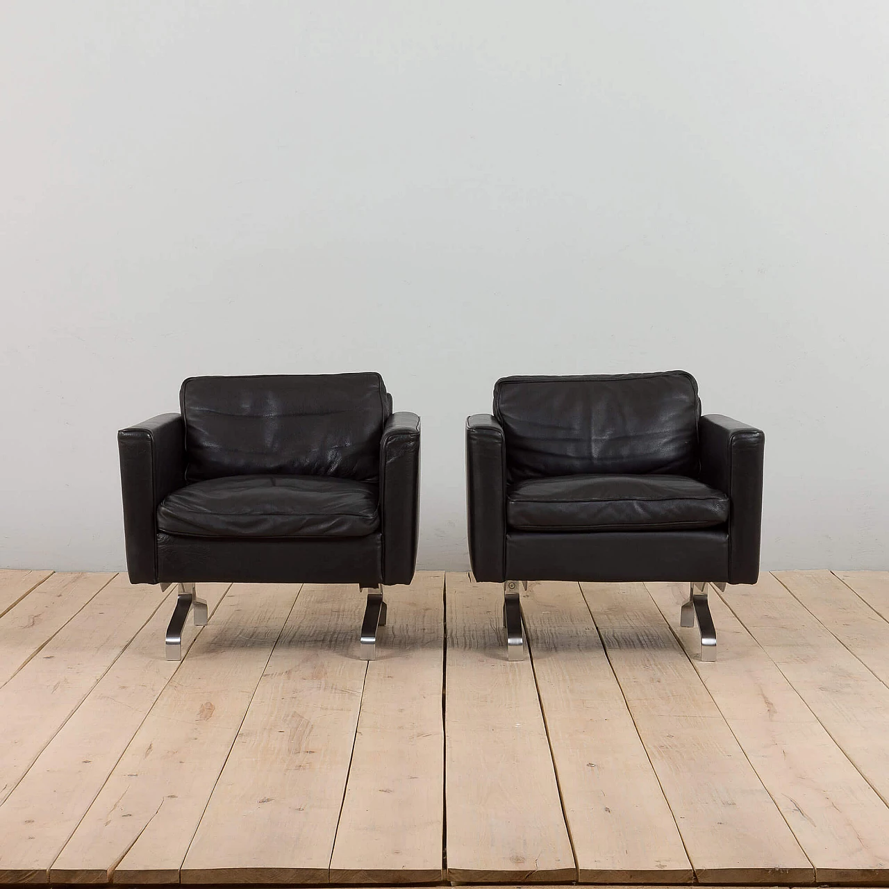 Pair of Scandinavian black leather lounge chairs in the style of Poul Kjaerholm, 1970s 3