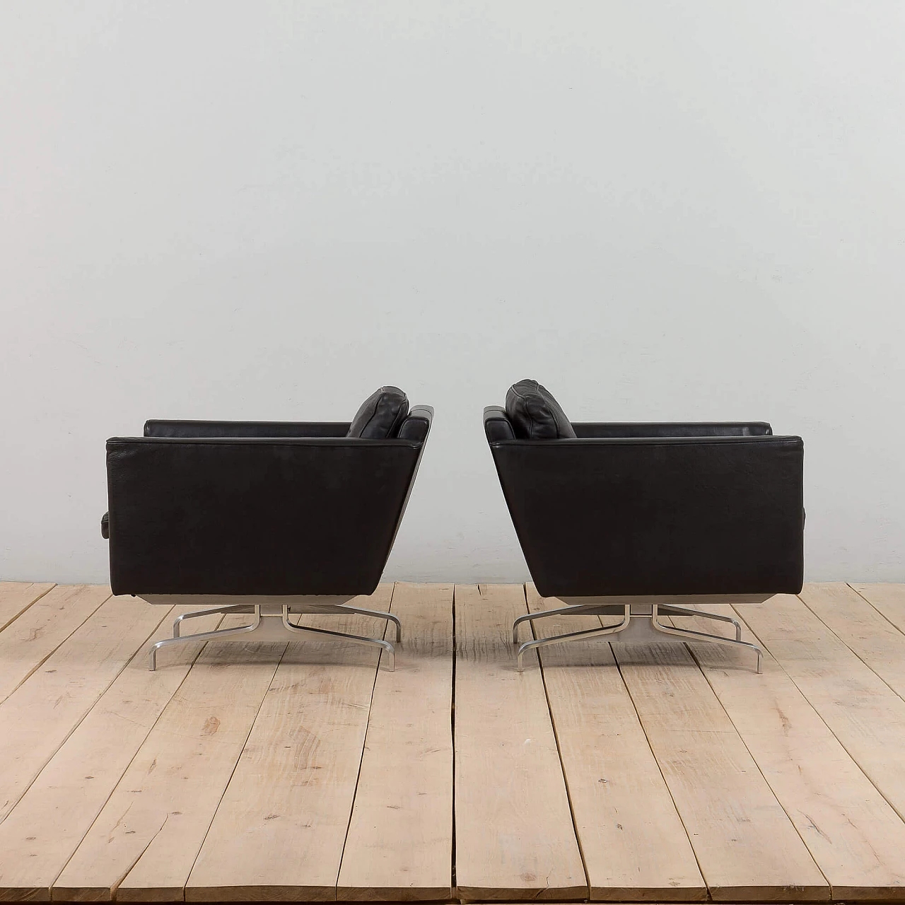 Pair of Scandinavian black leather lounge chairs in the style of Poul Kjaerholm, 1970s 5