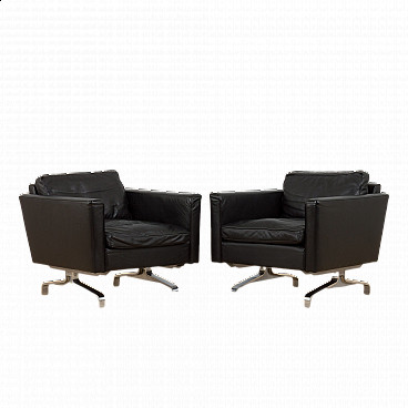 Pair of Scandinavian black leather lounge chairs in the style of Poul Kjaerholm, 1970s