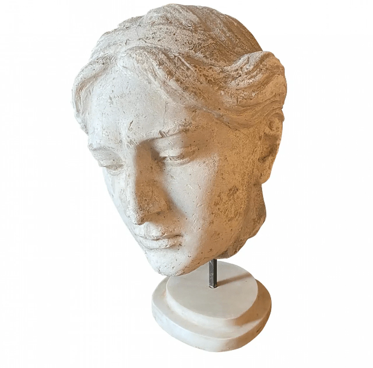 Plaster cast of a head on a white marble base, early 20th century 1