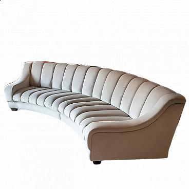 Curved dove grey velvet sofa