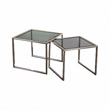 Pair of coffee tables in brass, chromed metal and smoked glass, 1970s