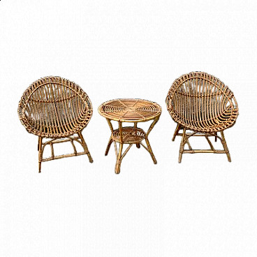 Pair of armchairs and small table in bamboo and wicker, 1950s