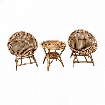 Pair of armchairs and small table in bamboo and wicker, 1950s