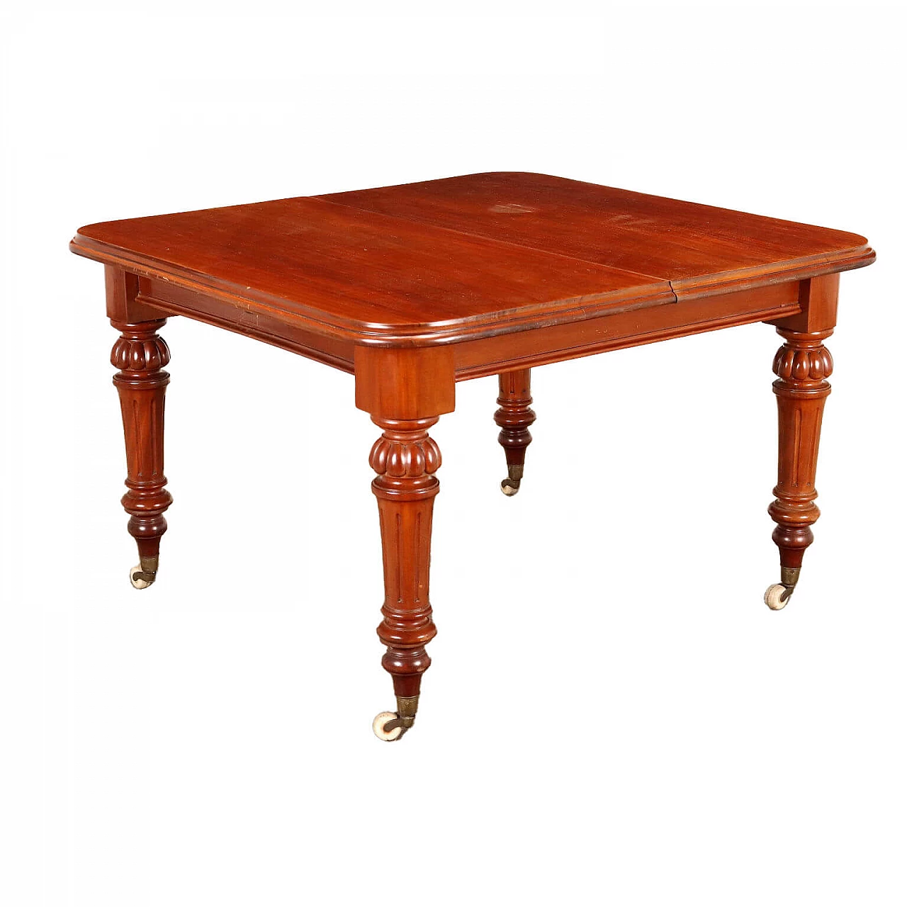 English mahogany extendable table with casters, mid-19th century 1