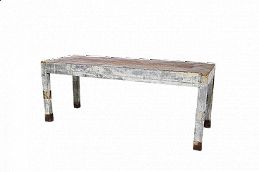 Wooden table with riveted sheet metal covering, 20th century