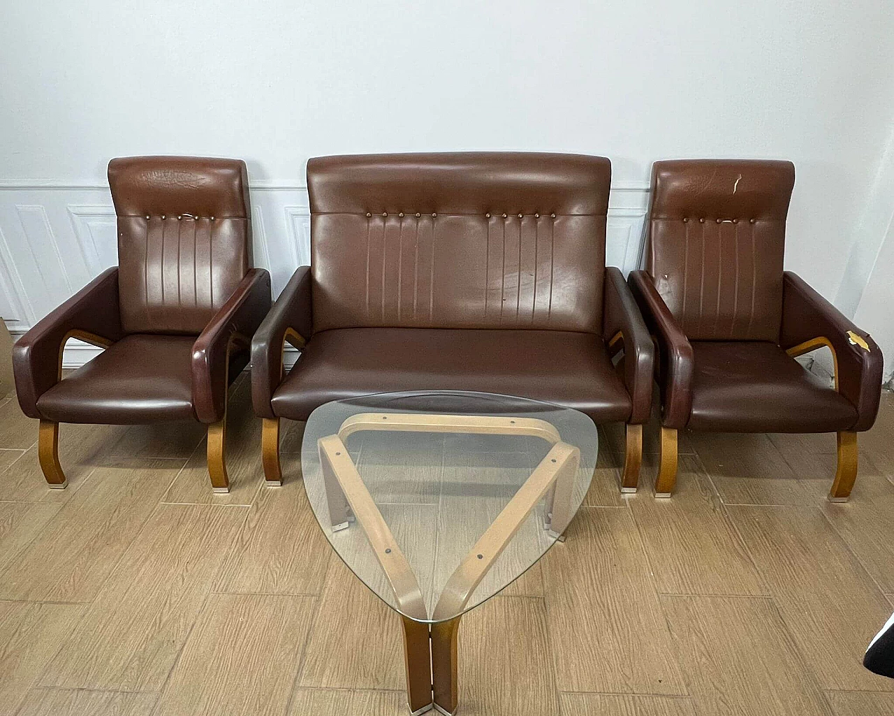 Sofa and pair of armchairs in leather and glass side table, 1960s 1